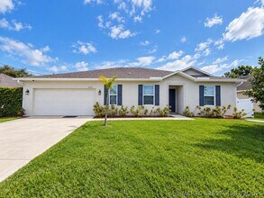 Building Photo - 1025 SW Sarto Ln