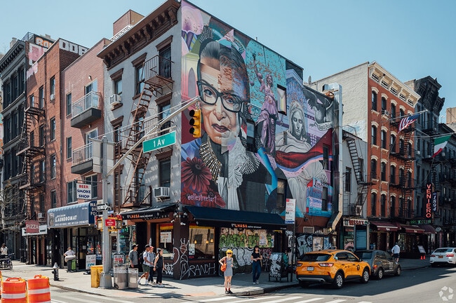 Murals adorn apartments that are above local shops and restaurants.