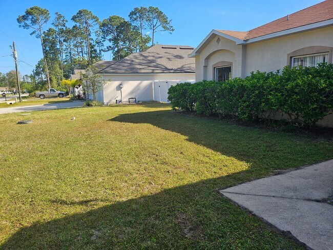 Foto del edificio - Newly renovated 3 bed, 2 bath home located minutes from Palm Coast dining, shopping, and the beach