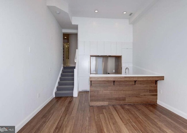 steps up to the Den off of the Kitchen / Living Space - 4600 Kenmore Dr NW