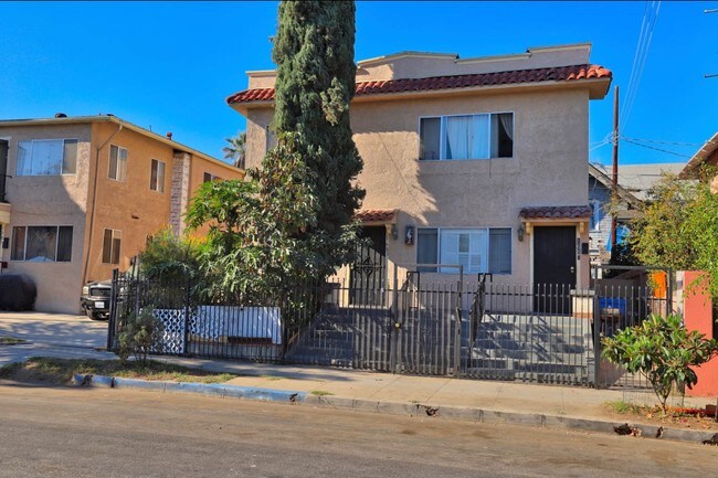 Building Photo - 6 Units in Harvard Heights