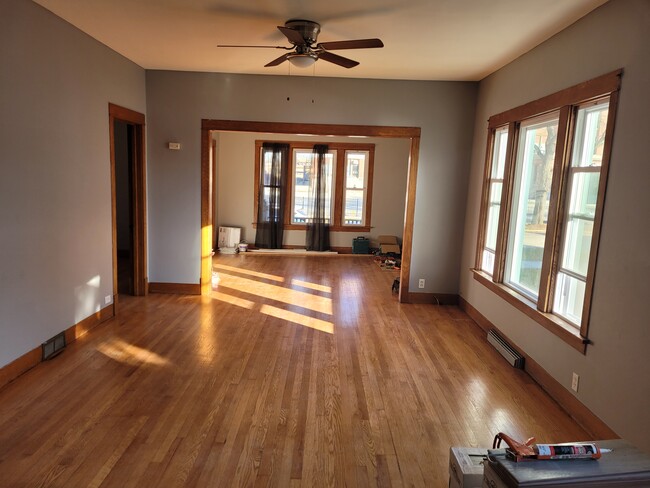 Living room and dining room. - 13210 S Burley Ave