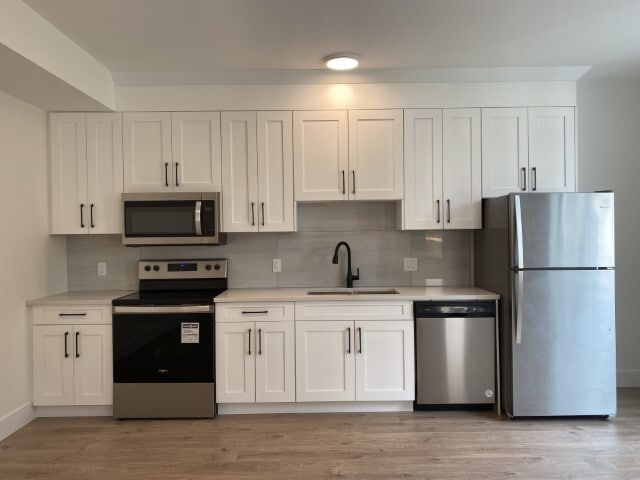 Building Photo - 1343 Langara Dr