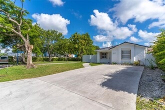 Building Photo - 9999 NW 25th Terrace