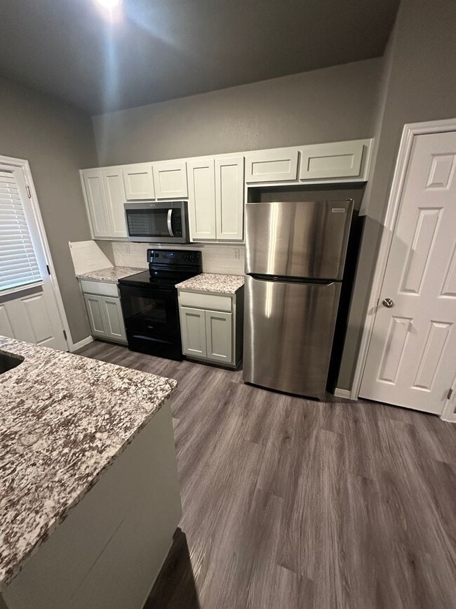 Building Photo - NEW IN MANAGEMENT - AVAILABLE NOW!