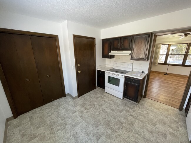 Kitchen with a nice pantry seen on left. - 715 Westgate St