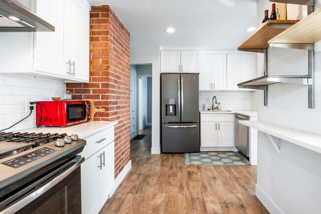 Building Photo - Updated and Bright Home with Yard