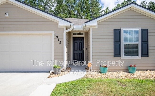 Building Photo - 6914 Sandle Dr