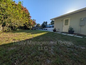 Building Photo - 7271 Holiday Dr
