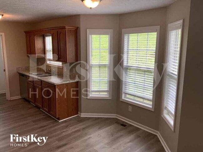 Building Photo - 6009 Pleasant Hill Dr