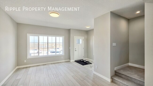 Photo du bâtiment - BRAND NEW 3 BEDS, 2.5 BATHS MAIN FLOOR | NEVER LIVED IN & MODERN FINISHES