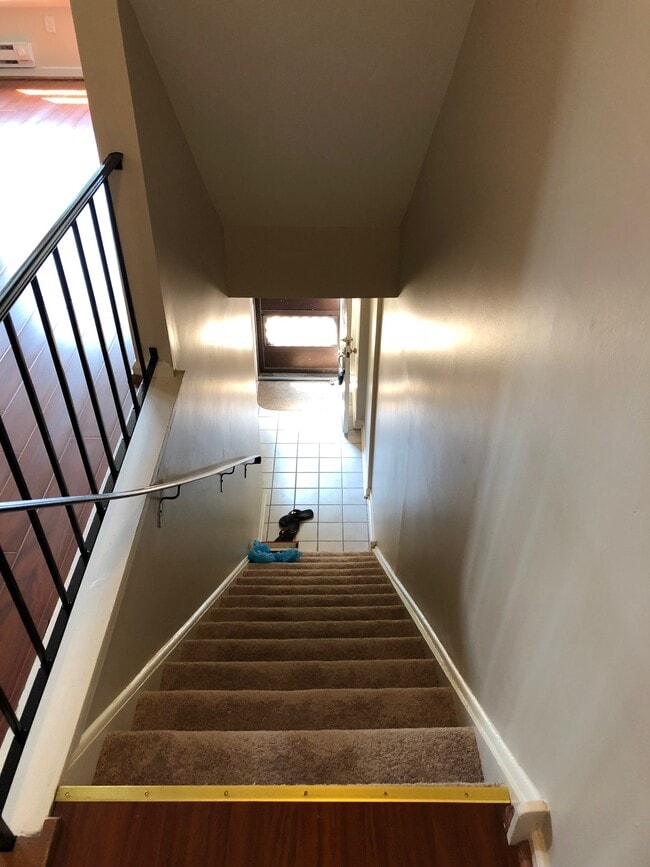 Main stairs up to Living room - 195 Stirling Ct