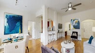 Located in the vibrant Washington Corridor neighborhood of Houston, TX, this thoughtfully designed 2-bedroom, 2-bathroom residence offers a comfortable and functional single-floor layout. The open living area immediately impresses with warm hardwood flooring, soaring ceilings adorned with crown molding, and a ceiling fan that enhances the airy atmosphere. Large windows flood the space with natural light, creating an inviting ambiance throughout. Elegant arched doorways connect the living, dining, and entry areas, adding a classic architectural charm.

The kitchen features rich wood cabinetry, dark granite countertops, a stone tile backsplash, and stainless steel appliances, complemented by a breakfast bar with seating. A dedicated pantry provides ample storage. The adjacent dining area offers a seamless flow ideal for entertaining.

The generously sized primary bedroom includes plush carpeting and access to a well-sized walk-in closet with built-in wire shelving. Both bathrooms are clean and functional, with the second featuring a full tub-shower combination and tile flooring. A built-in office nook with a desk and overhead shelving adds practicality. With five closets and an in-unit laundry room, storage and convenience are abundantly addressed throughout this well-appointed Houston residence.