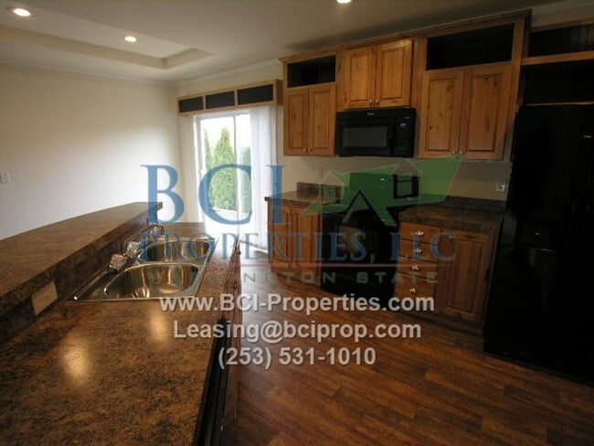 Building Photo - Welcome Home to Evergreen Place Condominiu...