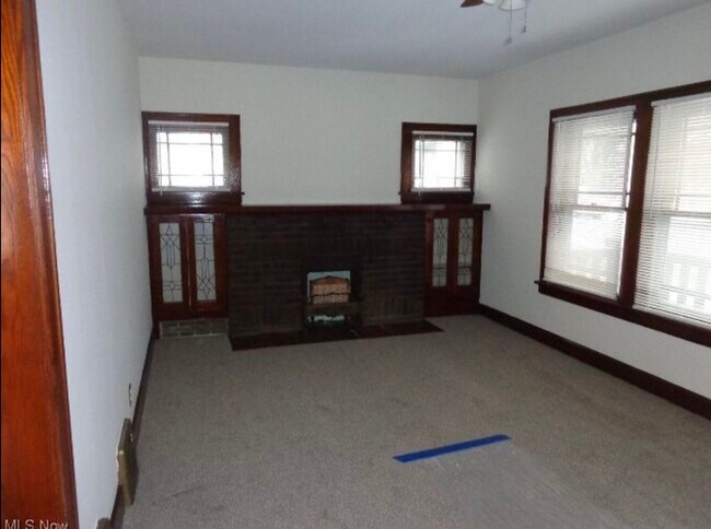 Living Room with built-ins and fireplace - 4345 W 49th St
