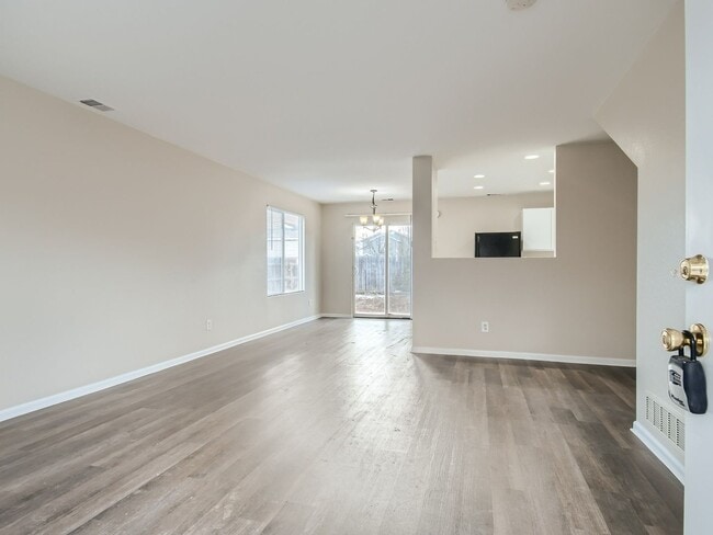 Building Photo - Evolve Real Estate: AVAILABLE JULY 5, 2026! Bright 2 Bedroom + 1 Car Attached Garage Home!