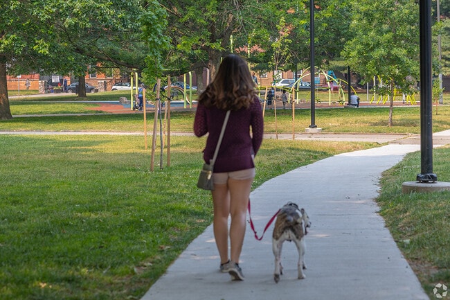 Norris Square Park offers walking paths for residents.
