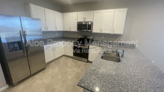 Building Photo - 36415 W Maddaloni Ave