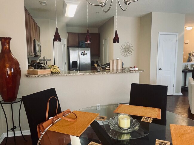 Breakfast bar with gorgeous accent lighting. - 4941 Travertine Ave