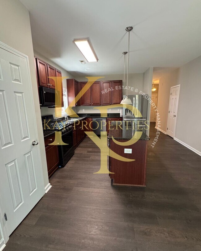 Foto del edificio - 5904 Sandpiper Farm Ln