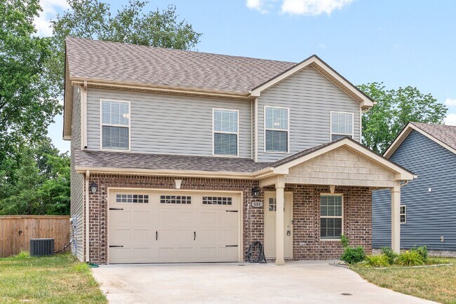 Building Photo - Like new construction rental located in a ...