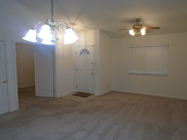 Building Photo - JUST REDUCED BY $100 PER MONTH.   & MOVE I...