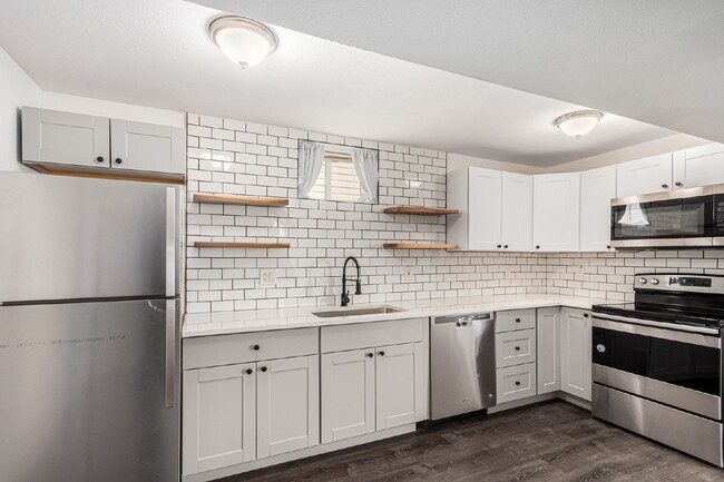 Building Photo - Stunning 1-bedroom, 1-bathroom garden leve...