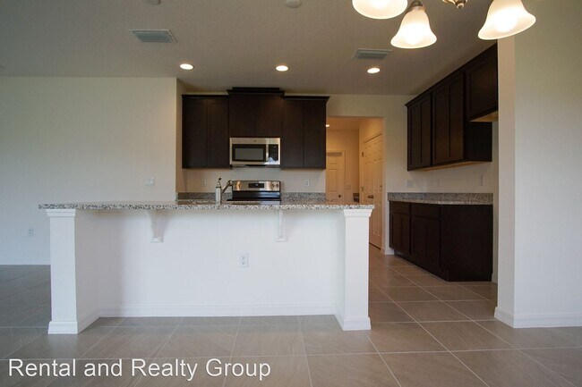 Foto del edificio - 5 br, 2.5 bath House - 1677 Swan Swim Dr