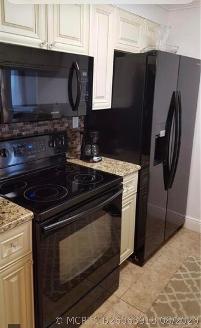 Foto del edificio - 9466 Boca Cove Cir