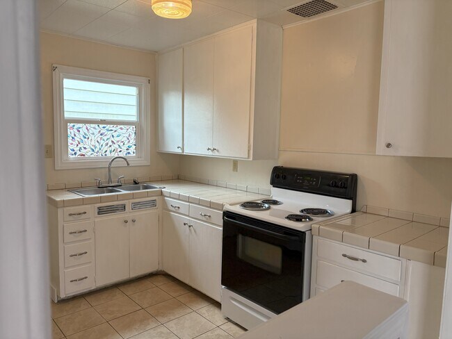 kitchen with range - 2229 Lee St SE