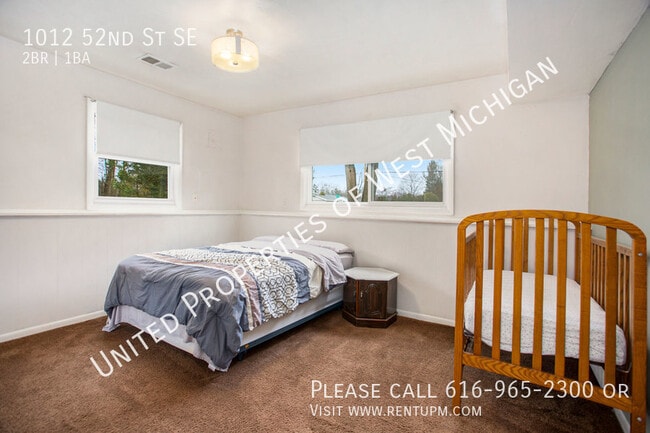 Building Photo - Available Now | 2 Bed 1 Bath Lower Unit Ap...