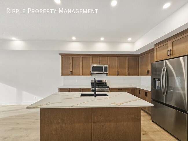 Photo du bâtiment - AMAZING 3 BEDS 2.5 BATHS BRAND NEW TOWNHOUSE