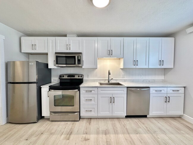 Foto del edificio - 6123 E Trent Ave