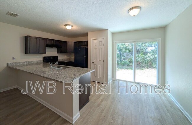 Photo - 7820 Playschool Ln Townhome