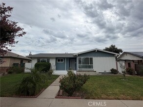 Building Photo - 6934 Woodlake Ave