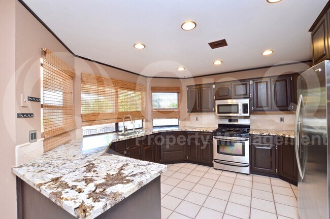 Building Photo - Enjoy All That Val Vista Lakes Has To Offer !