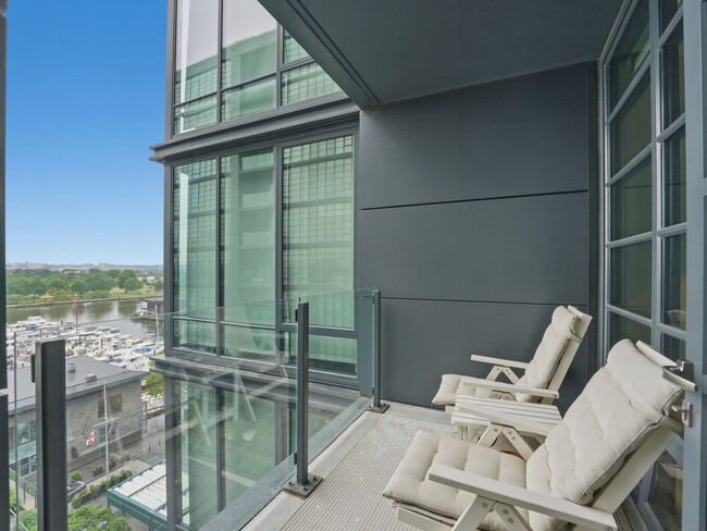 Building Photo - Designer-Furnished Waterfront Living at VIO Condominiums!