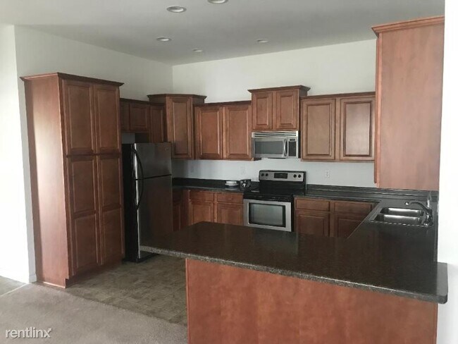 Building Photo - 2 br, 2 bath Condo - 6554 Casper Ct