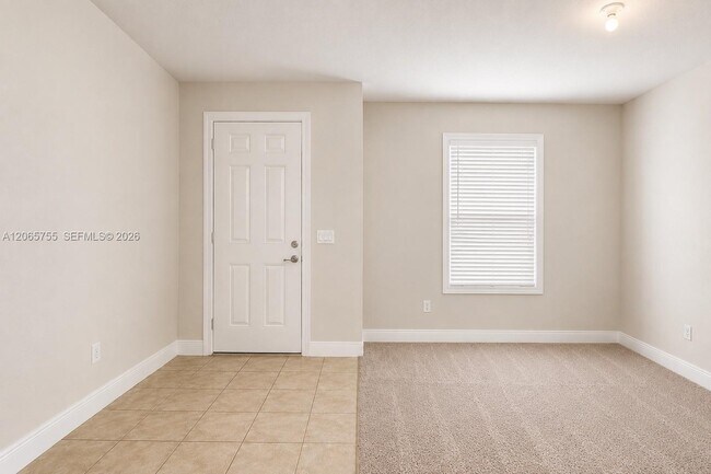Building Photo - 10976 SW Tessili Wy