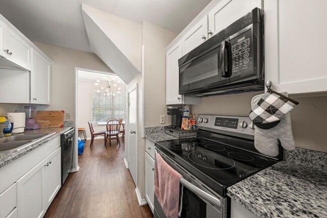 Building Photo - Tastefully Renovated 3/2.5 Condo Steps fro...