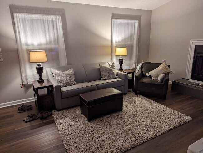 Entrance opens into a family room with a fireplace - 1109 Scott Alan Cir