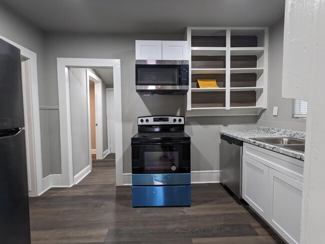 Kitchen with stainless steel appliances - 104 S Cleveland Ave