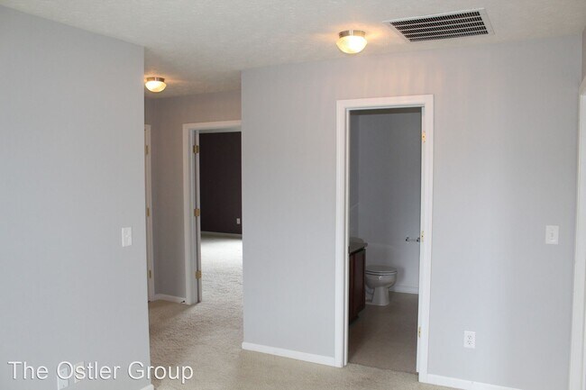 Building Photo - 4 br, 2.5 bath House - 6455 Enclave Blvd