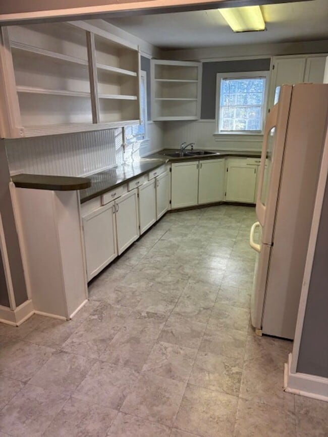 Building Photo - Where Style Meets Serenity — Your New Home Awaits