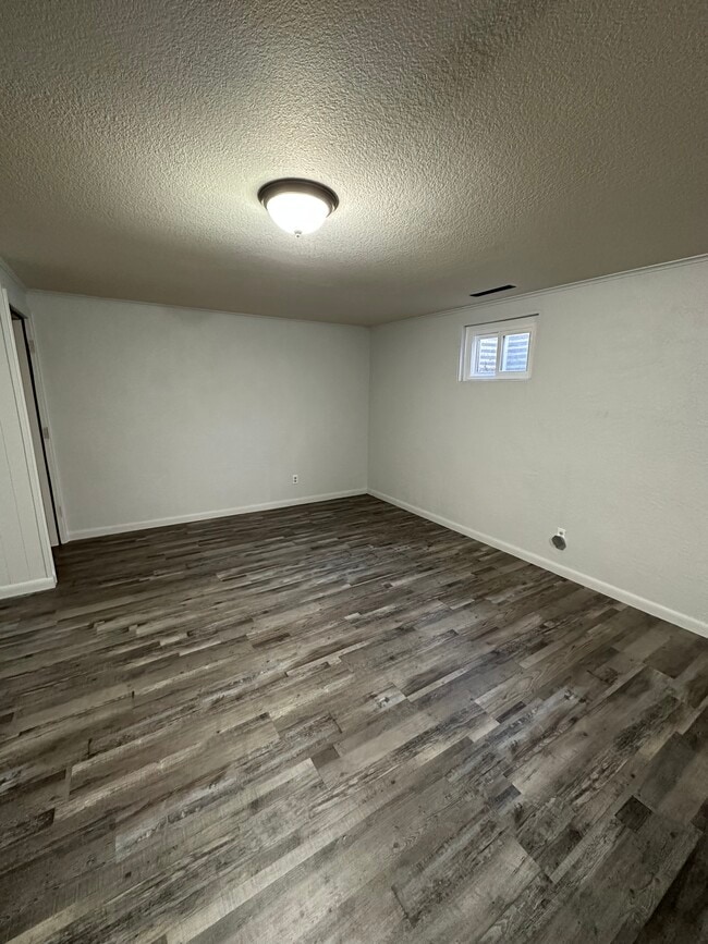 Standing in kitchen viewing living room space - 815 Kingsley Dr