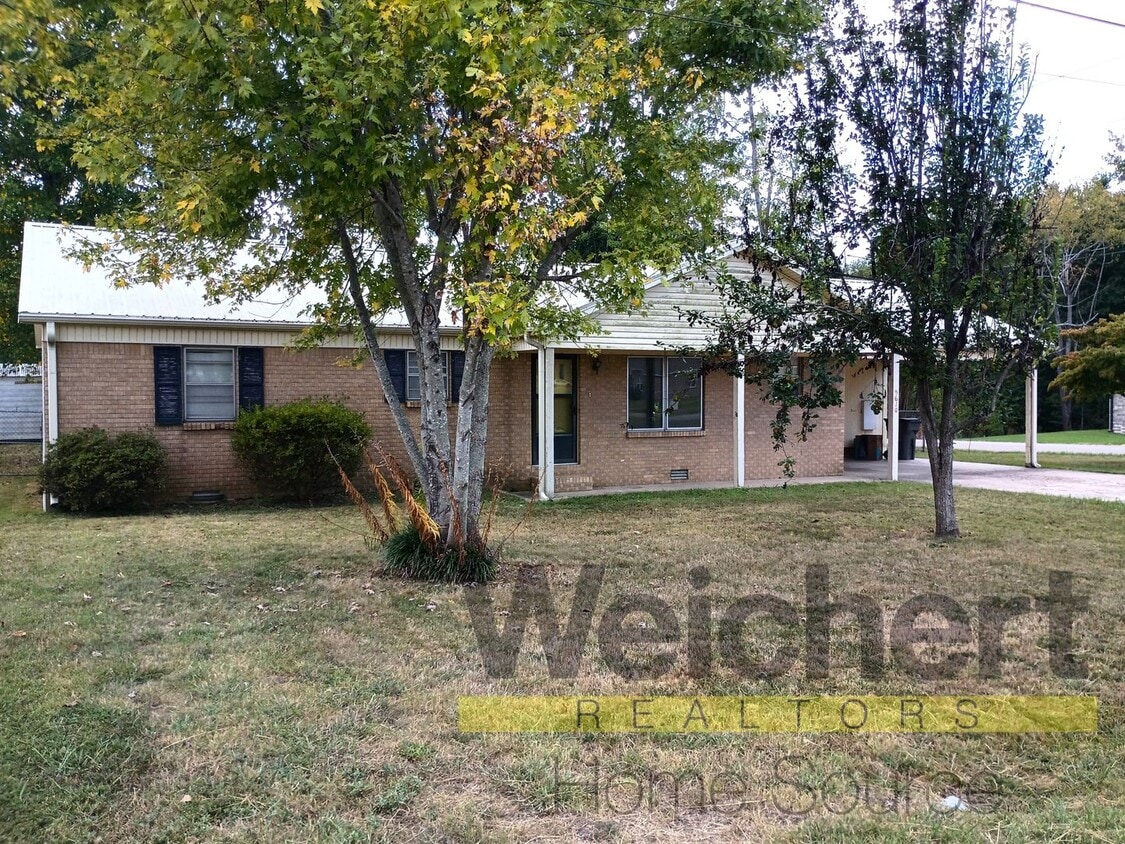 Primary Photo - Updated 4-Bed Home with Fenced Yard & Carport