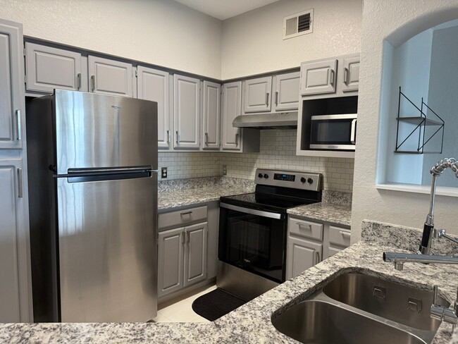 Building Photo - $1975 | 3-Bedroom 2-Bath Condo | Fully Ren...