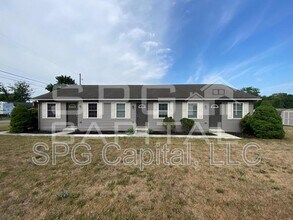 Building Photo - 8065 White Church Rd