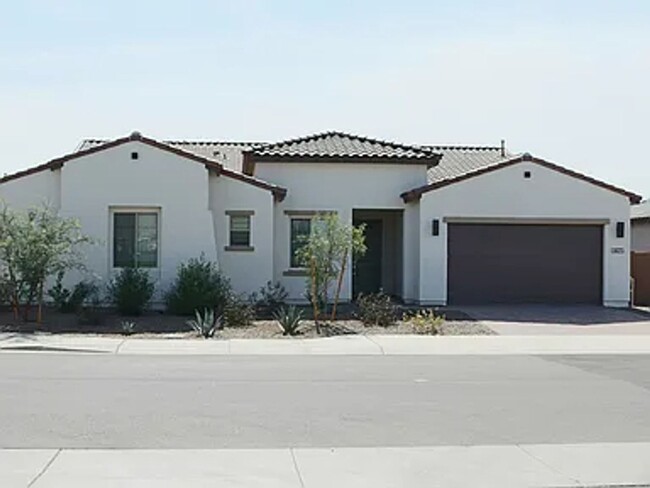 Building Photo - The gourmet kitchen features high-grade