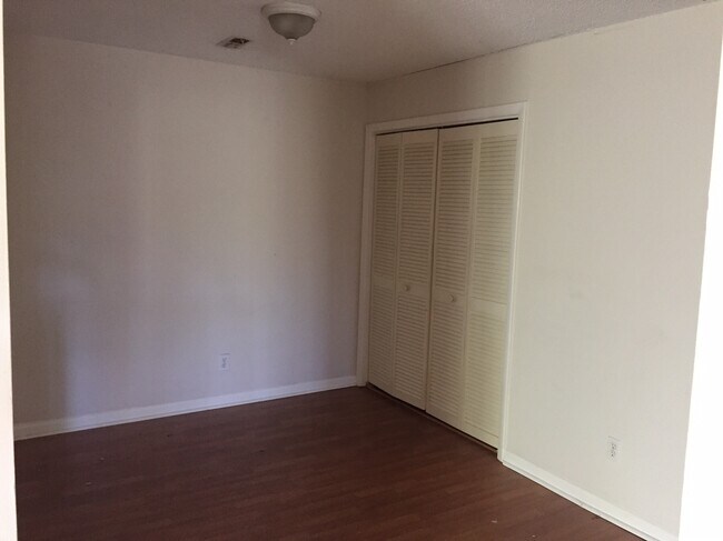 Dining room with laundry closet. Washer and dryer provided. - 5159 Windy Hill Drive